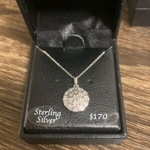 Sterling silver necklace with charm
